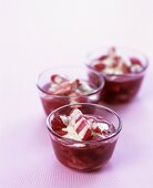 Three bowls of rhubarb & raspberry compote with vanilla custard