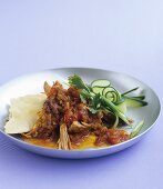 Lamb with Moroccan spices, cucumber salad and pita bread