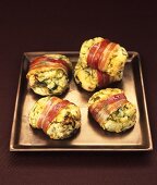 Baked bacon-wrapped potato and Brussels sprout parcels