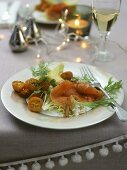 Marinated salmon on kumquat salad