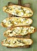 Pizza flatbreads topped with potato, rosemary & sheep's cheese