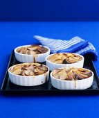 Small potato gratins in baking dishes
