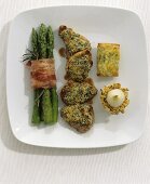 Pork fillet with herb crust and assorted accompaniments