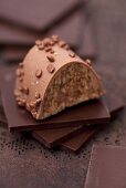 Nougat praline on squares of chocolate
