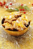 Christmas star-shaped biscuits with candided orange peel