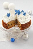 Fruit cake with meringue and sugar stars