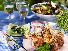 Grilled chicken legs and herb butter