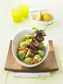 Lamb kebab with Brussels sprouts and apricots