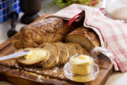 Bread being spread with butter