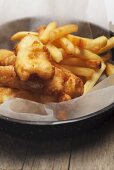 Fish and chips on grease-proof paper