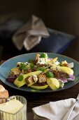 Warm pear and walnut salad with blue cheese and croutons