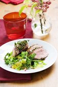 Goose breast with a thyme crust and orange savoy cabbage