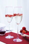 Strawberry punch in champagne glasses with a sugared rim
