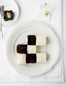 Chessboard dessert (Lamingtons and coconut ice cream)