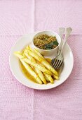 Asparagus with orange sauce and herb couscous