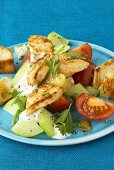 Tomato & cucumber salad with fried chicken breast, yoghurt sauce