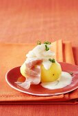 Boiled potato with asparagus and ham