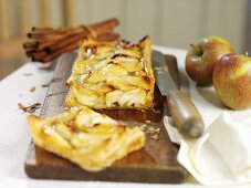 Rustic apple pie on chopping board