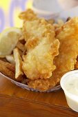 Fish and chips in cardboard tray