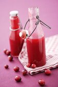 Home-made cranberry sauce in bottles