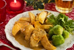 Veal with orange sauce and Brussels sprouts