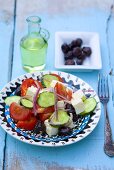 Greek salad, olives and olive oil