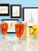 Orange cocktails, peppermill & lemons, pictures depicting Paris