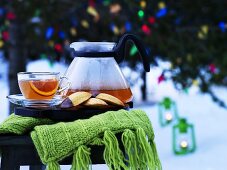 Blood orange tea on garden table (Christmas)