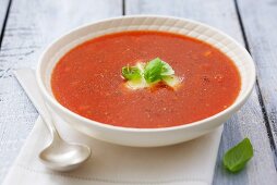 Tomato soup with mozzarella and basil