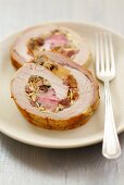 Pork roulade stuffed with almonds and raisins