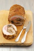 Rolled roast pork with buckwheat and plum stuffing
