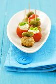 Meatballs with gherkins and tomatoes with soft cheese stuffing