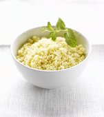 Couscous in bowl with mint