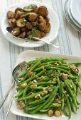 Green beans with pine nuts and roast potatoes