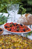 Baked peppers with olives and courgette bake