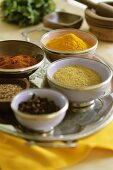 Assorted spices in small bowls