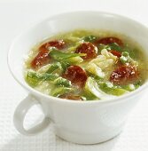 Savoy cabbage soup with paprika sausage
