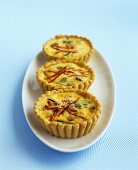 Cheese and spring onion tartlets