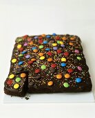Chocolate cake with coloured chocolate beans