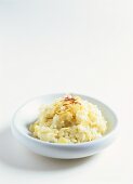 Rice pudding with flaked almonds and saffron