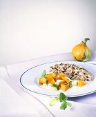 Pumpkin and courgettes with sauce and rice