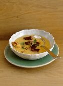 Polenta soup with smoked duck breast