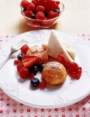 Baked semolina dumplings with berries and yogurt parfait