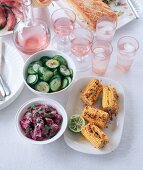 Grilled corn cobs, cucumber salad and beetroot salad