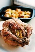 Roast chicken stuffed with corn