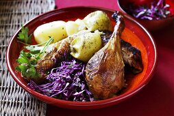 Goose leg with red cabbage