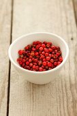 A bowl of red peppercorns