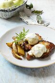 Pork chops with apples and potato wedges