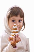 Girl with biscuit Christmas tree