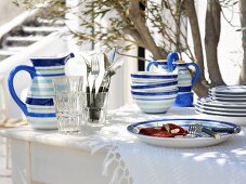 Table laid in Mediterranean style out of doors